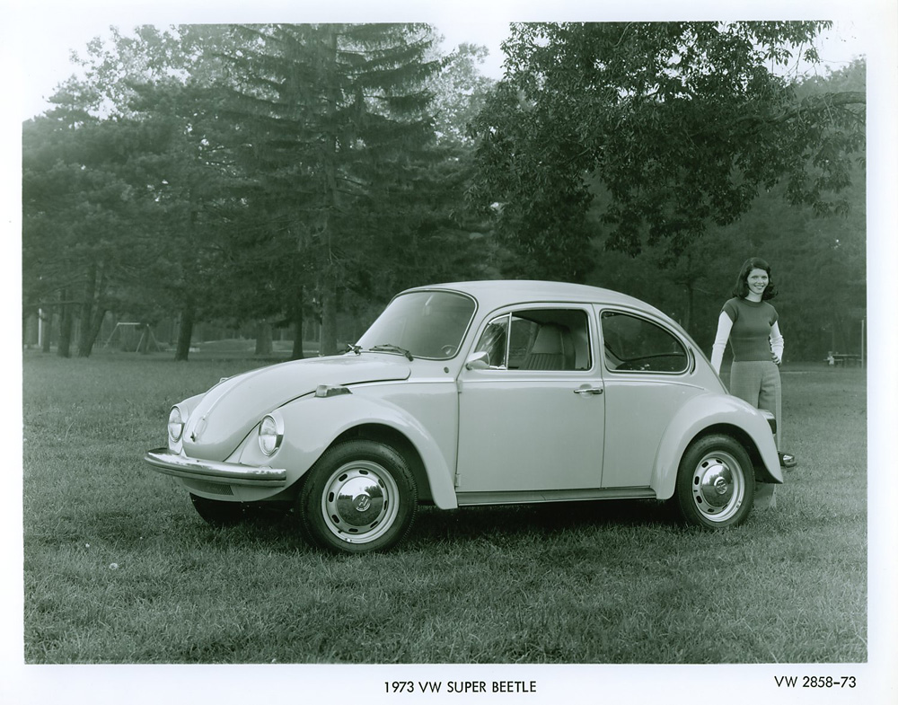 A 1973 Volkswagen Super Beetle promo picture. The Beetle is regarded as one of the most influential cars of the 20th century, with over 15 million produced by 1972. Super Beetle models featured updates like a larger, curved panoramic windscreen and a modified dashboard.