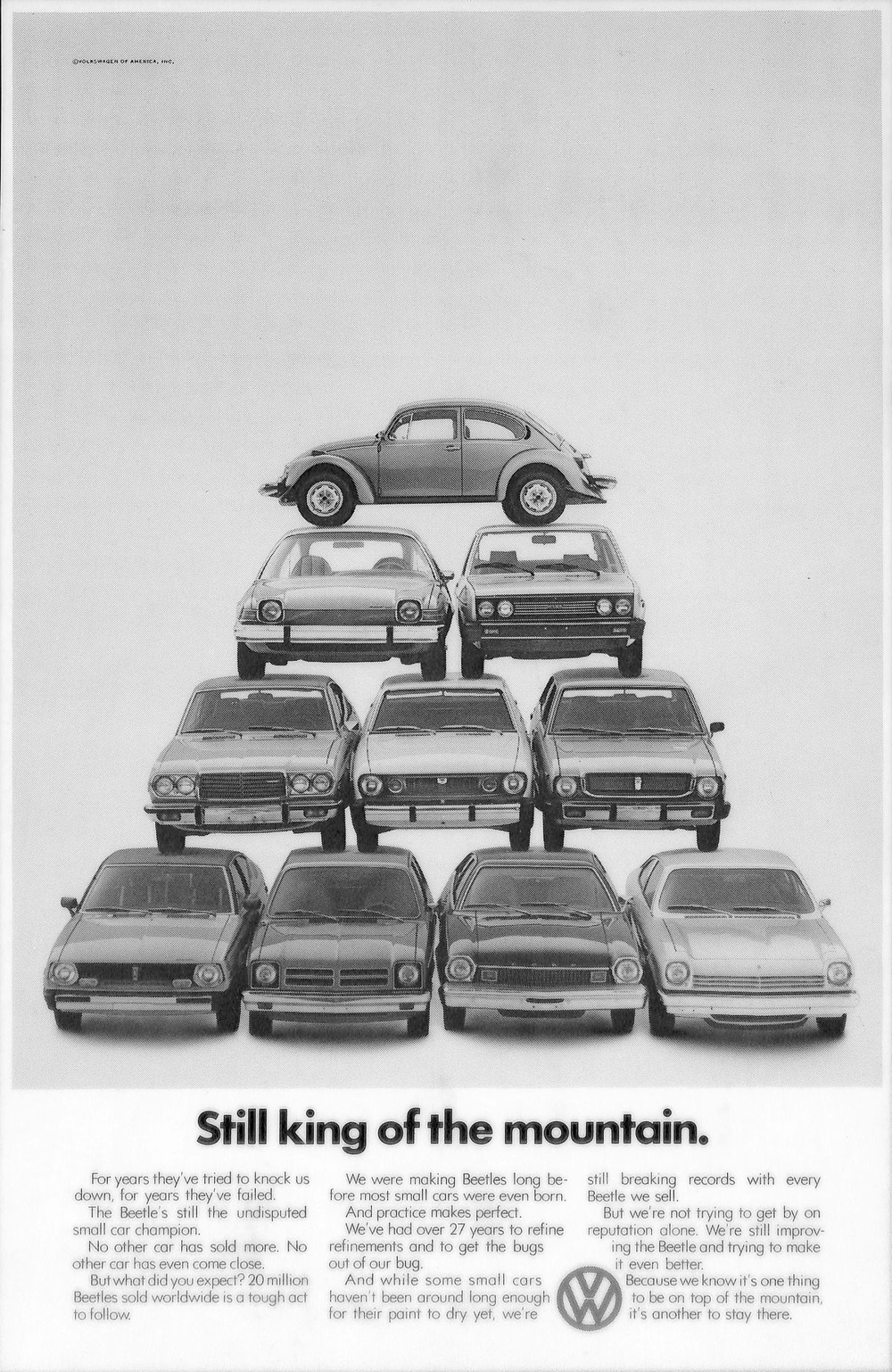 This is a vintage magazine advertisement for the Volkswagen Beetle, titled "Still king of the mountain."