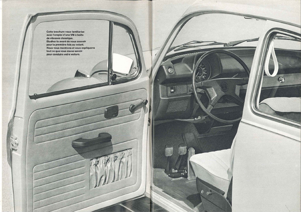  Vintage VW brochure showing drivers door, dashboard, pedals and steering wheel