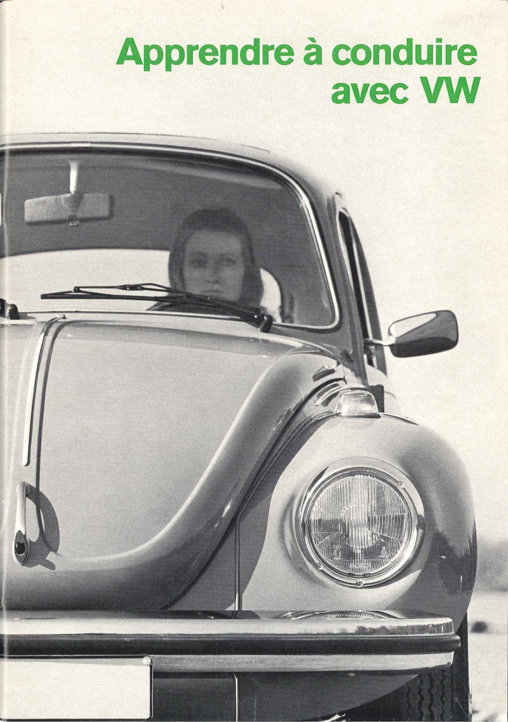 Vintage VW driving lesson cover showing front view of Beetle with driver inside