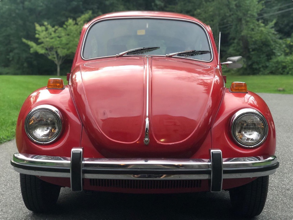 1302 Super Beetle front view with a small dent on the hood