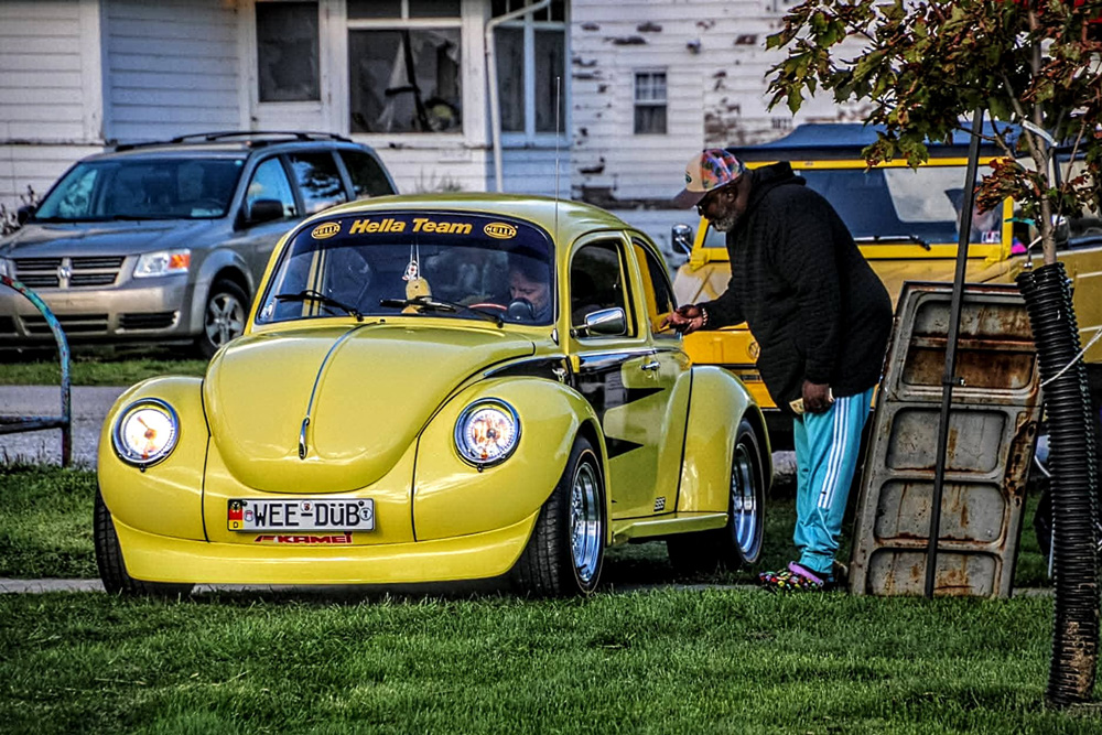 Yellow 1973 Super Beetle with a lowered stance and custom Top Line suspension kit
