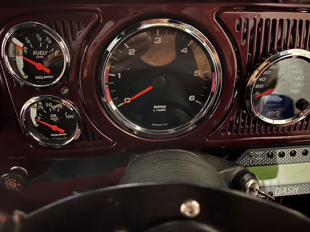 1302 Super Beetle dashboard equipped with Speedhut and Auto Meter gauges.