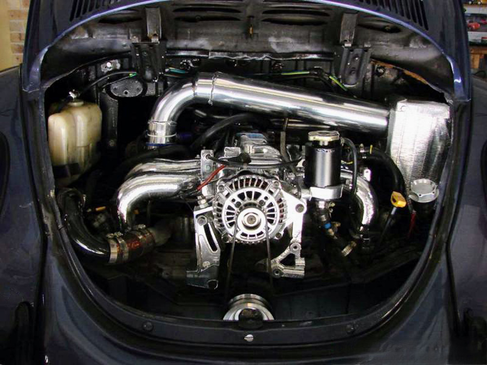 Modified Volkswagen Beetle that has undergone a Subaru engine swap, commonly referred to as a Suby Bug.