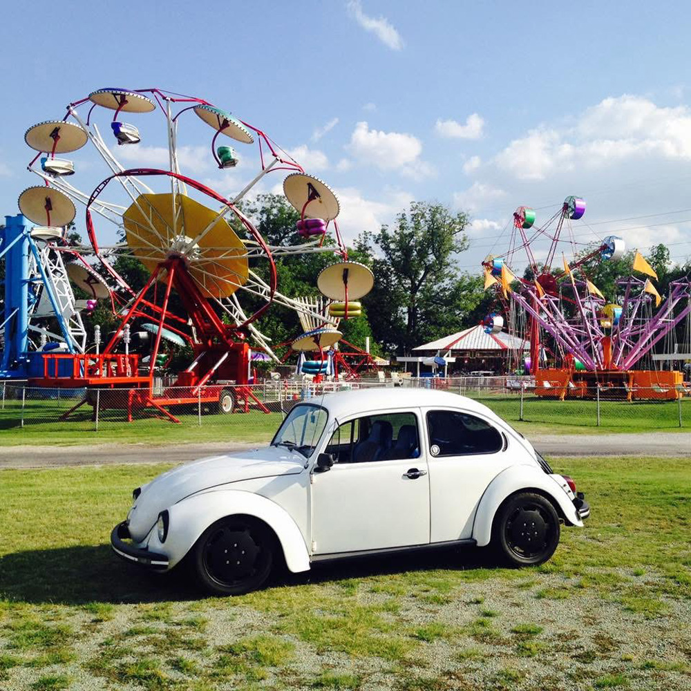 White 1302 Super Beetle at a carnival