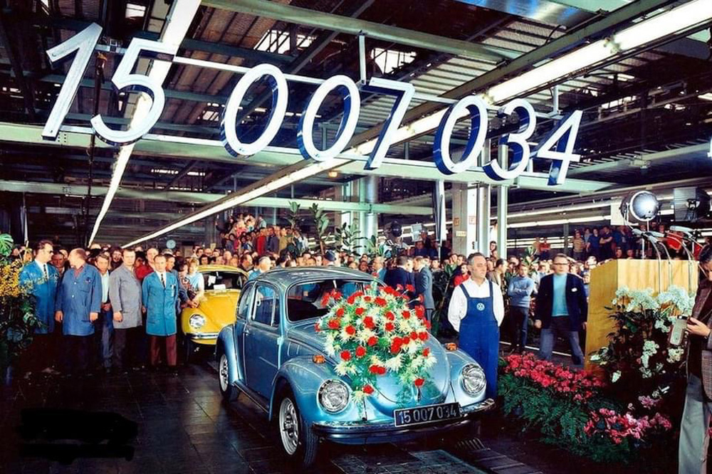 Blue Marathon Volkswagen Beetle decorated with flowers at a factory celebration marking the 15,007,034th Beetle produced