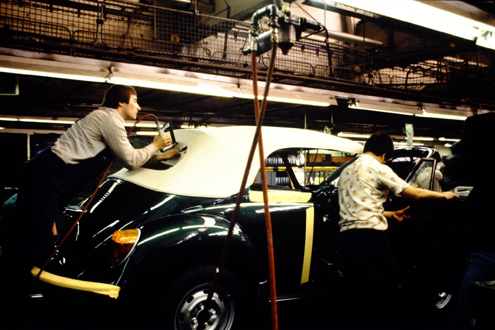 Fitting 
      the heated rear window glass and frame