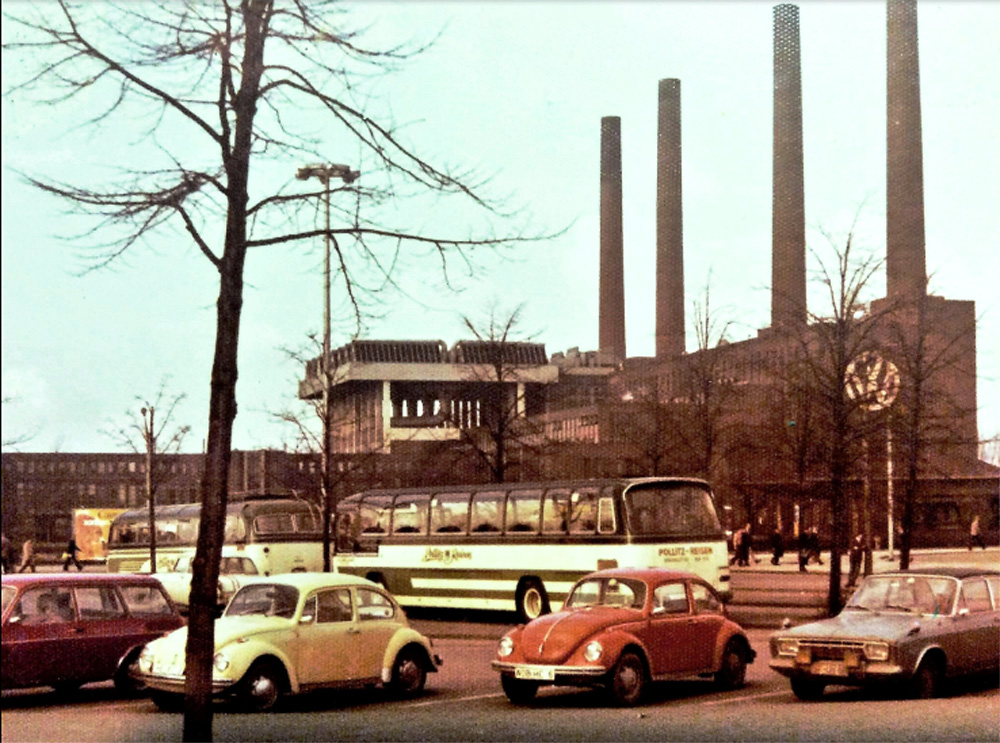 A Standard and Super Beetle parked outside the VW factory