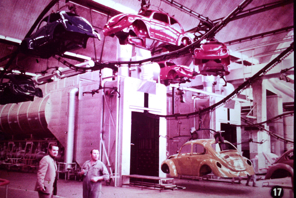 Volkswagen Super Beetles on the conveyor line move about the plant