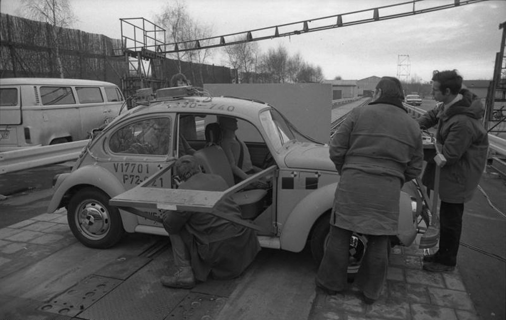 A 1302 Super Beetle is being set up for crash testing