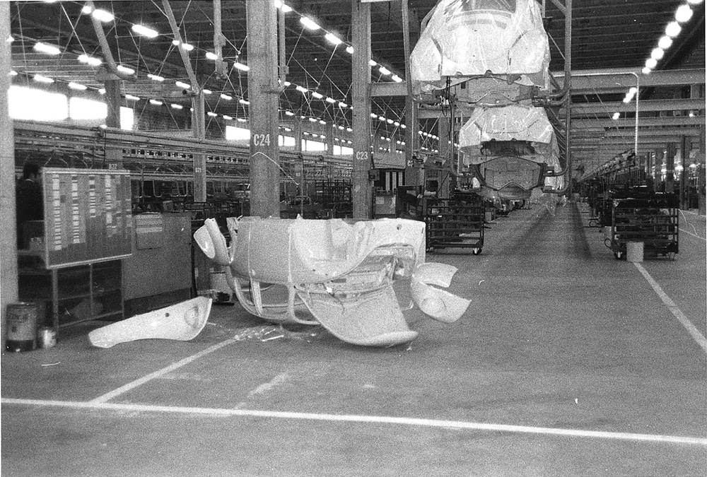 Beetle body is laying upside-down in the Volkswagen Brussels factory, during a summer holiday shutdown in the early 1970s. Thankfully not a Super Beetle
