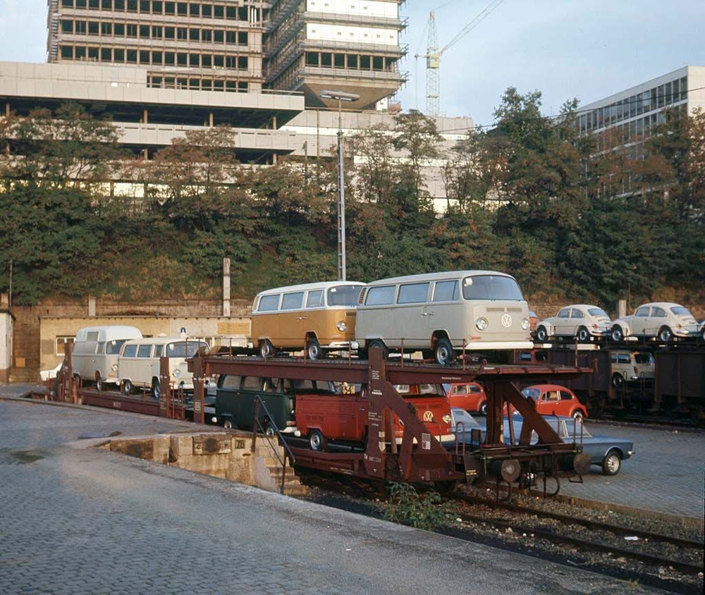 A wide assortment of 1972 Volkswagens at the main freight yard in Stuttgart. We see many different varieties of the Type 2, there are 1302s and a Type 3 Variant on the train in the back, and even a couple of K70s on the area between the tracks. This photo is dated September, 1971