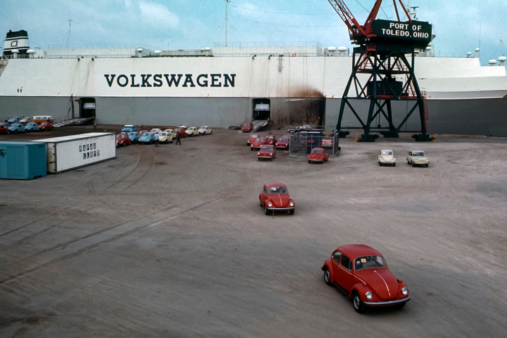 fresh 1972 Volkswagens are rolling off a Dyvi ship at the port of Toledo, Ohio. A single 411, a two-tone Bus, and a few Squarebacks are seen among the many Beetles